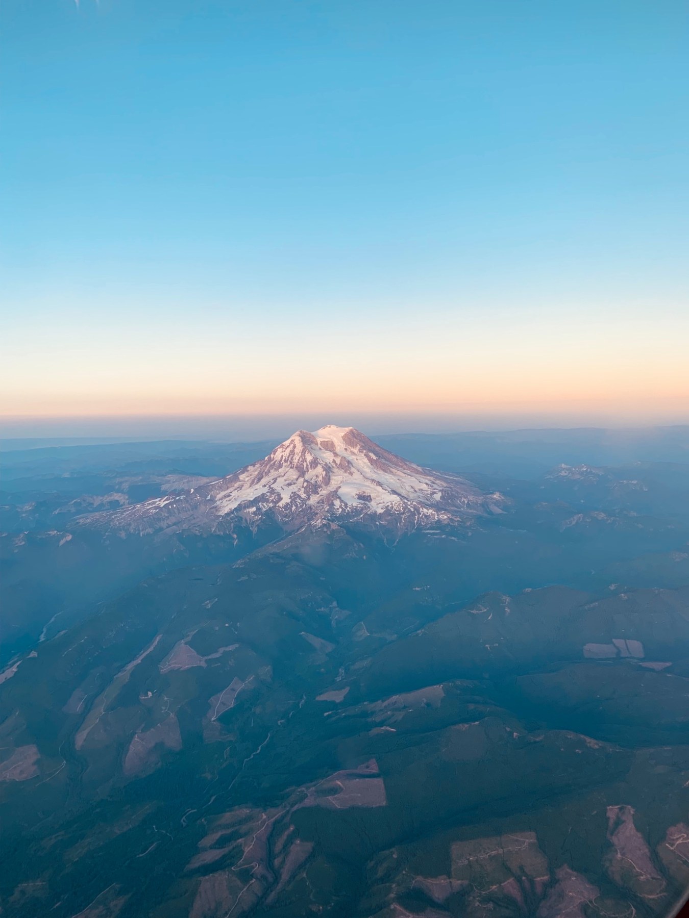 Aerial photograph of Mount Rainier at dusk